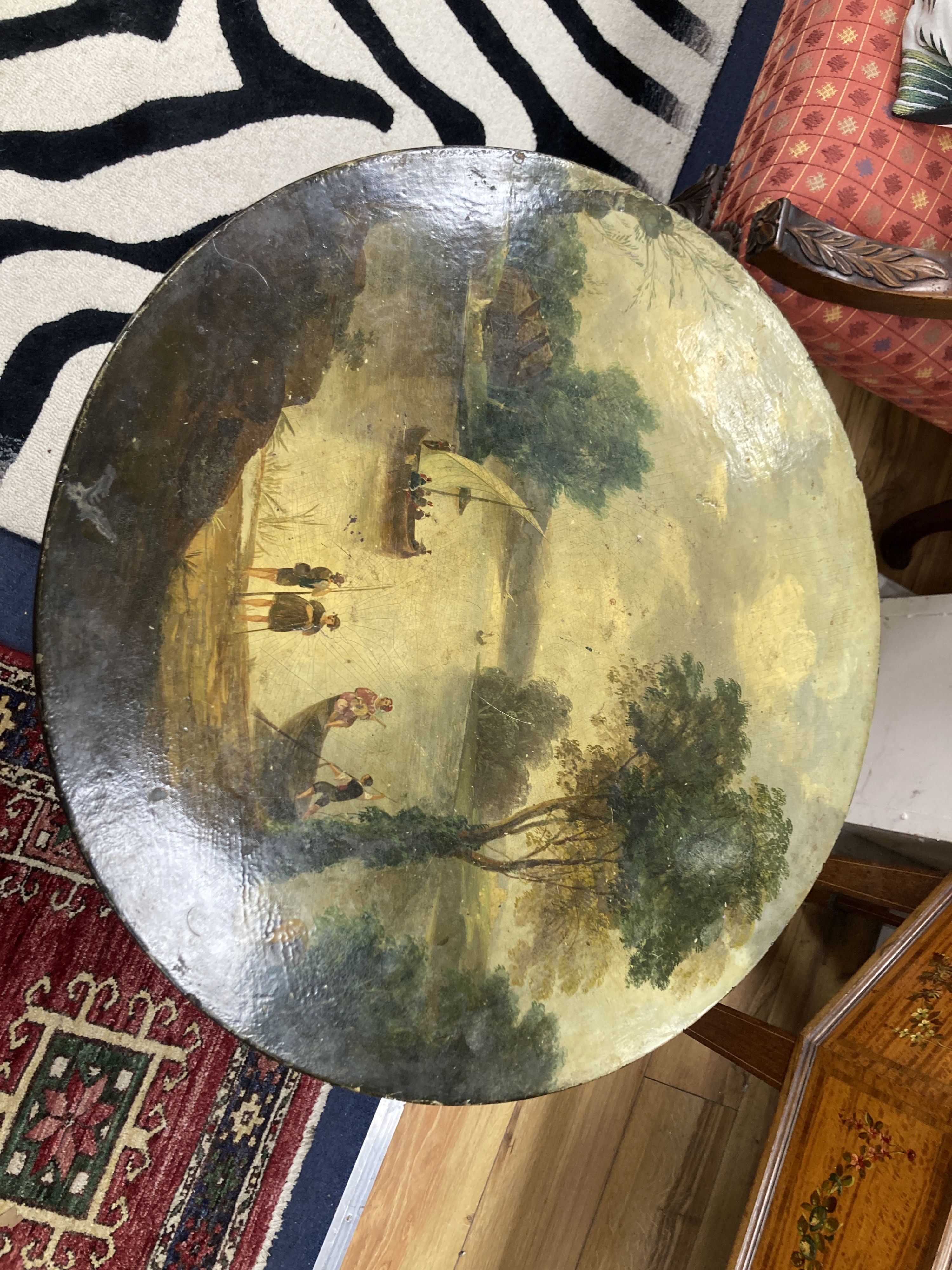 A Victorian and later painted papier mache circular tripod table on oak base. D-56, H-57cm.